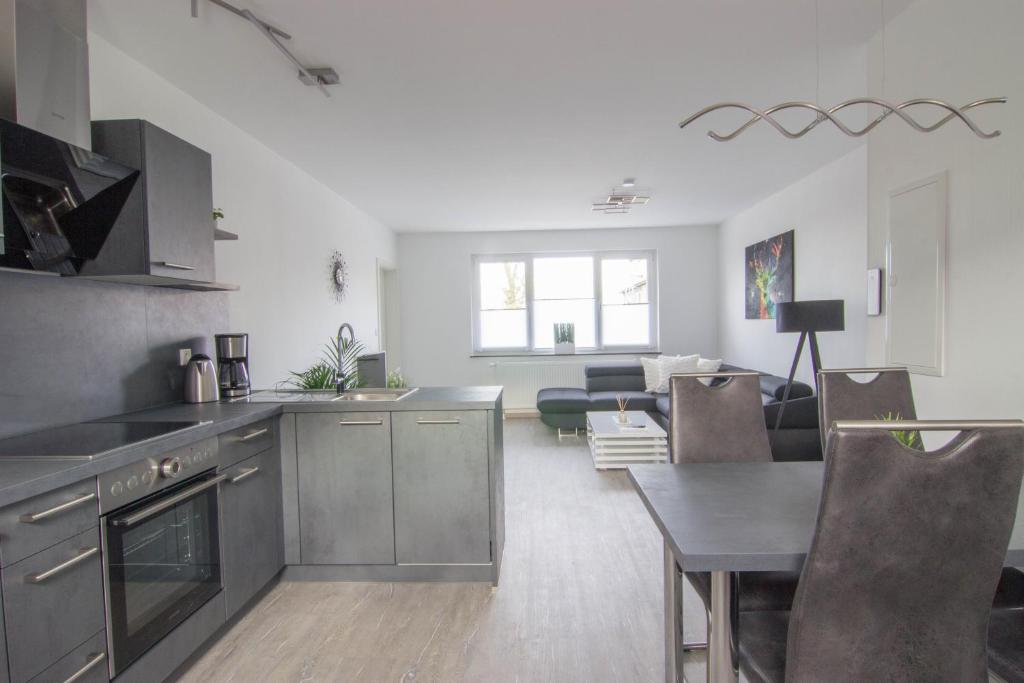 Kuchyň nebo kuchyňský kout v ubytování Appartements am Bodetal
