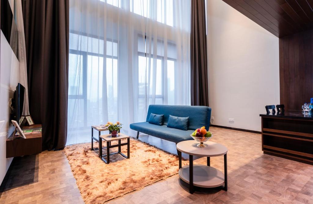 Posezení v ubytování Expressionz Professional Suites by MyKey