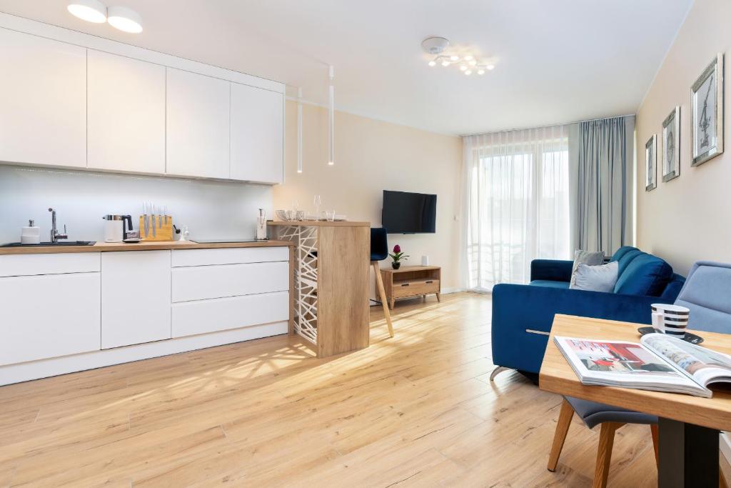 Kuchyňa alebo kuchynka v ubytovaní Apartment Awanport Gdynia Żeromskiego by Noclegi Renters