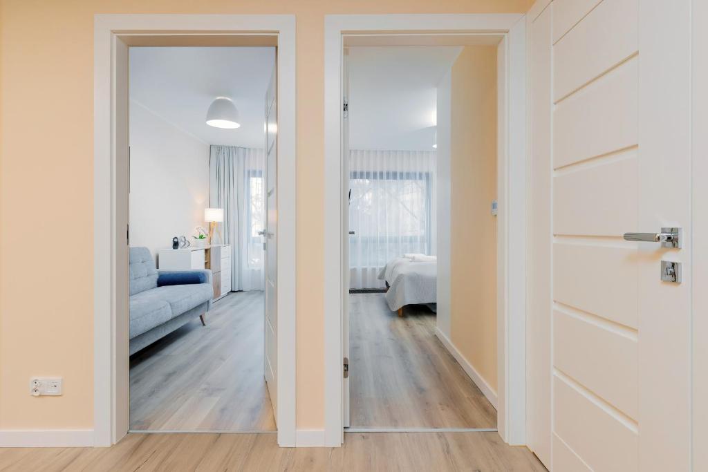 Posteľ alebo postele v izbe v ubytovaní Apartment Awanport Gdynia Żeromskiego by Noclegi Renters