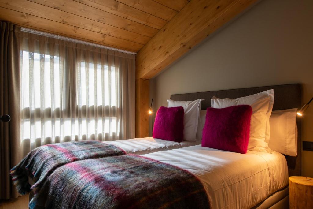 Postel nebo postele na pokoji v ubytování Vip Residences Andorra