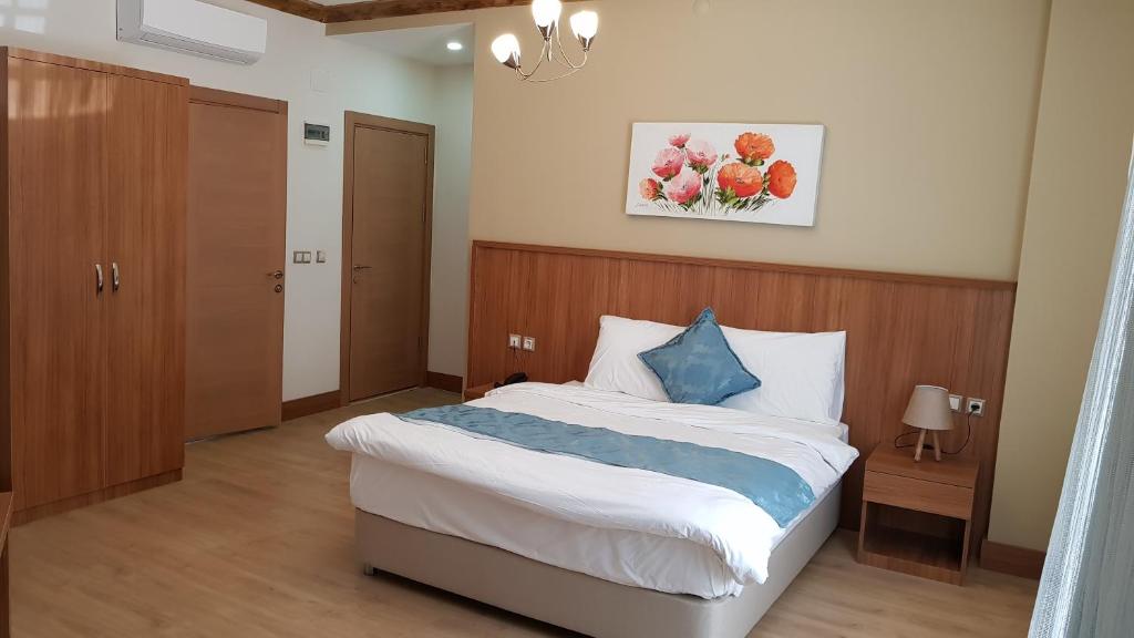 Кровать или кровати в номере ASİL OTEL