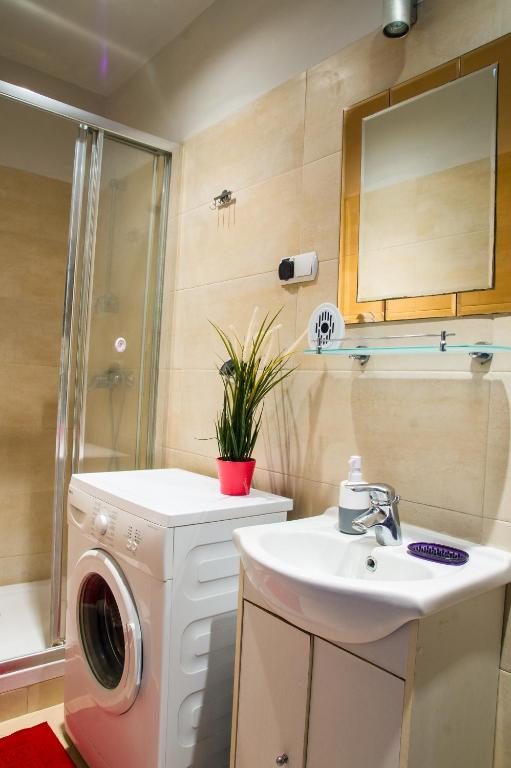 Kúpeľňa v ubytovaní Apartament Brązowy Narutowicza 11