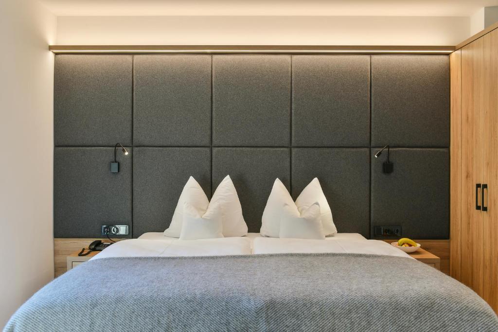Postel nebo postele na pokoji v ubytování Hotel Sonnblick