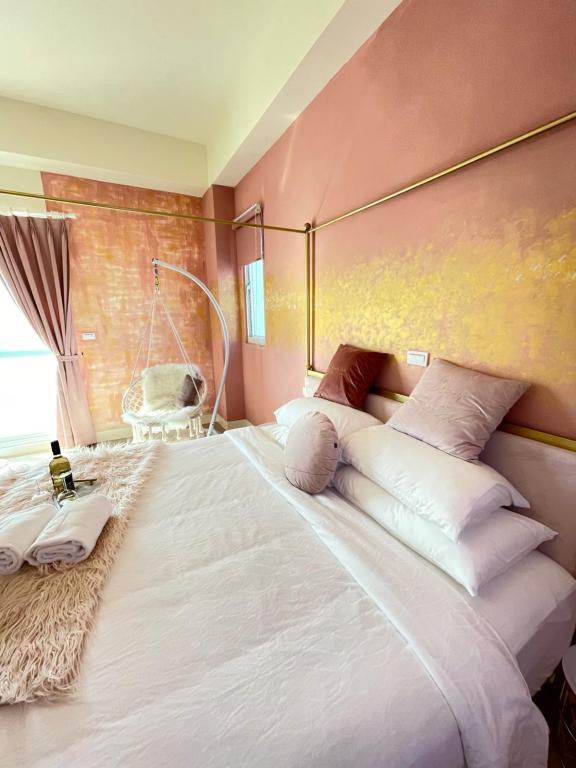 Postel nebo postele na pokoji v ubytování Pinky Promise Villa