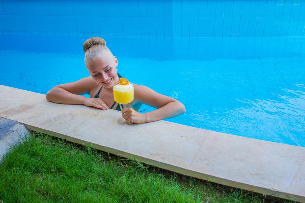 The swimming pool at or close to Orka Cove Hotel Penthouse & Suites Adults Only