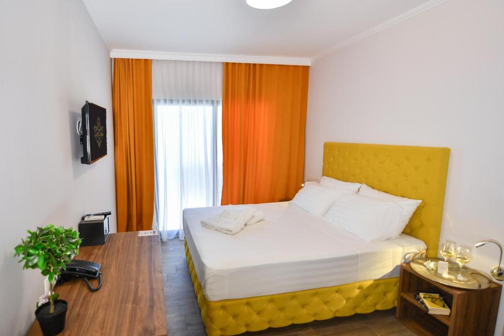 Postel nebo postele na pokoji v ubytování Hotel Palladium Sithonia