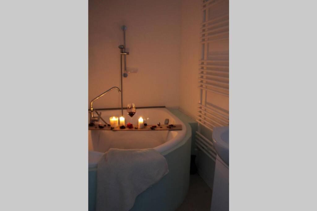 Posteľ alebo postele v izbe v ubytovaní No°21 Apartman
