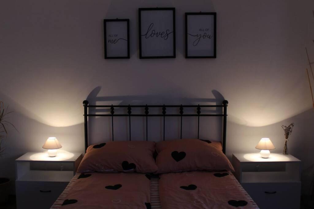 Posteľ alebo postele v izbe v ubytovaní No°21 Apartman