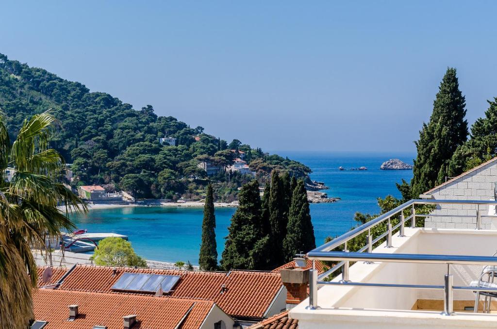 a view of the ocean from a house at Apartments Villa Perla in Dubrovnik