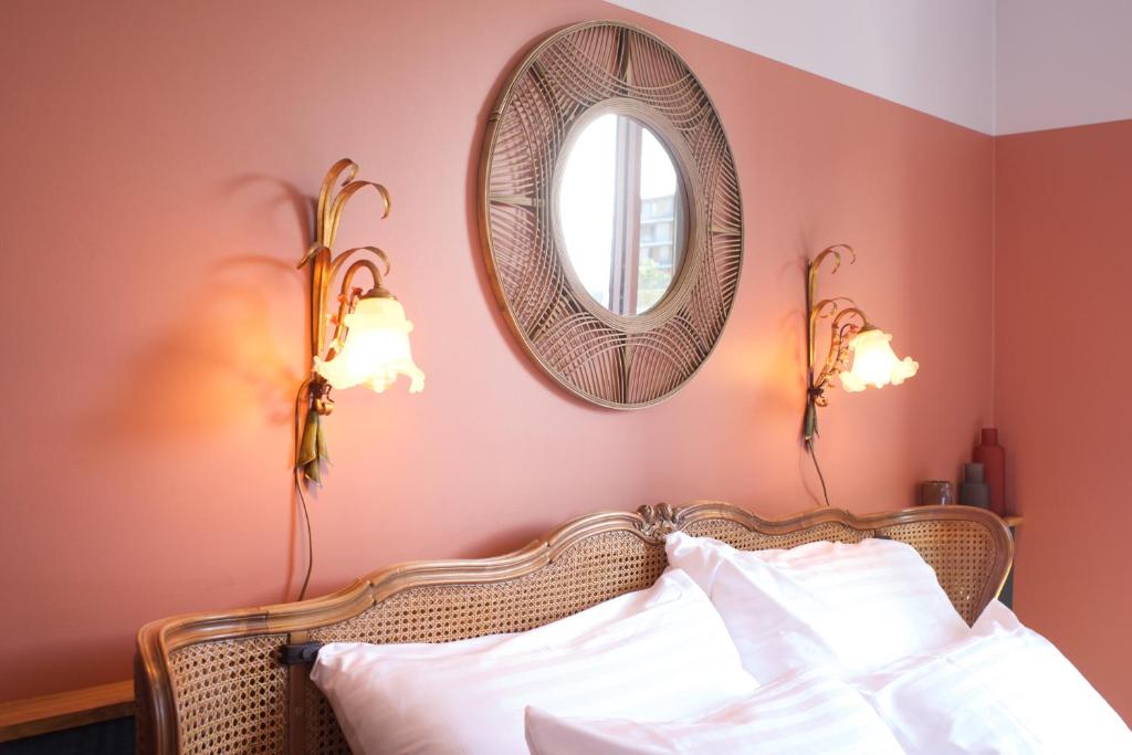 Postel nebo postele na pokoji v ubytování Auberge des Vergers