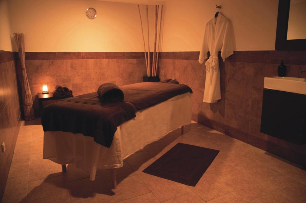 Postel nebo postele na pokoji v ubytování Riu Palace Aruba - All Inclusive