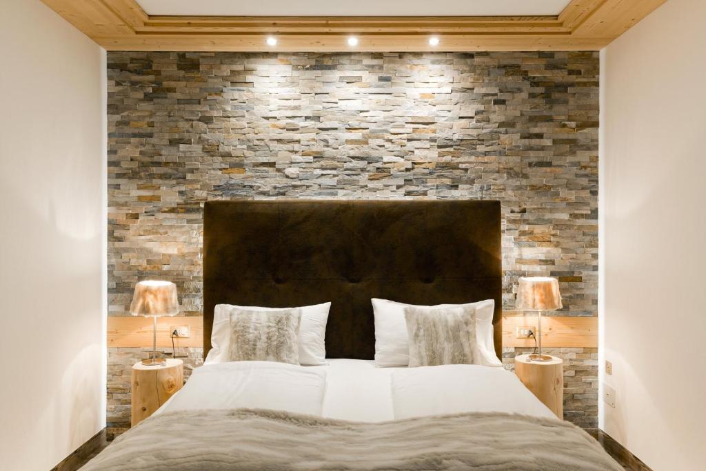 Łóżko lub łóżka w pokoju w obiekcie Croce Bianca Leisure & Spa Hotel