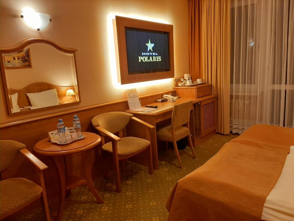 Postel nebo postele na pokoji v ubytování Hotel Polaris