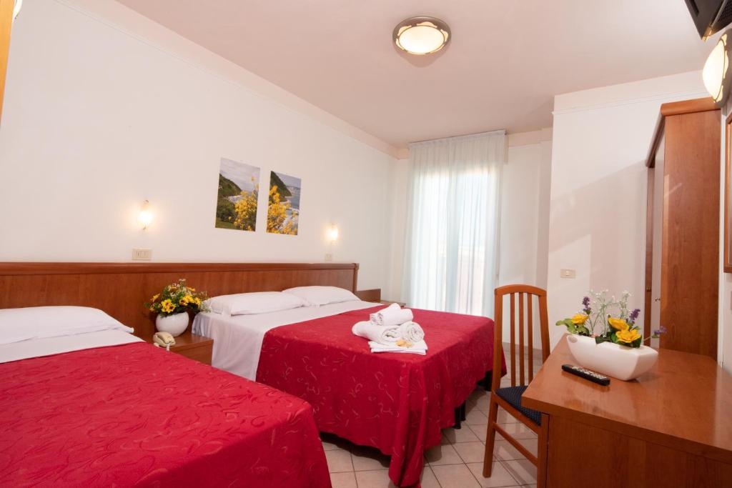 Postel nebo postele na pokoji v ubytování Hotel Acrux