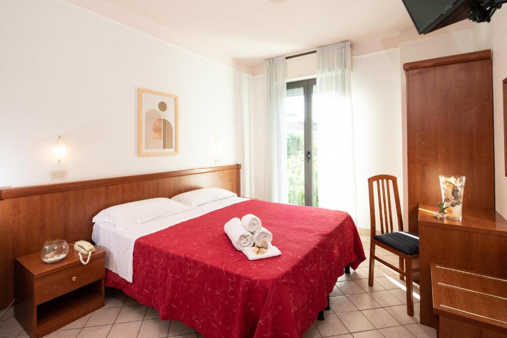 Postel nebo postele na pokoji v ubytování Hotel Acrux