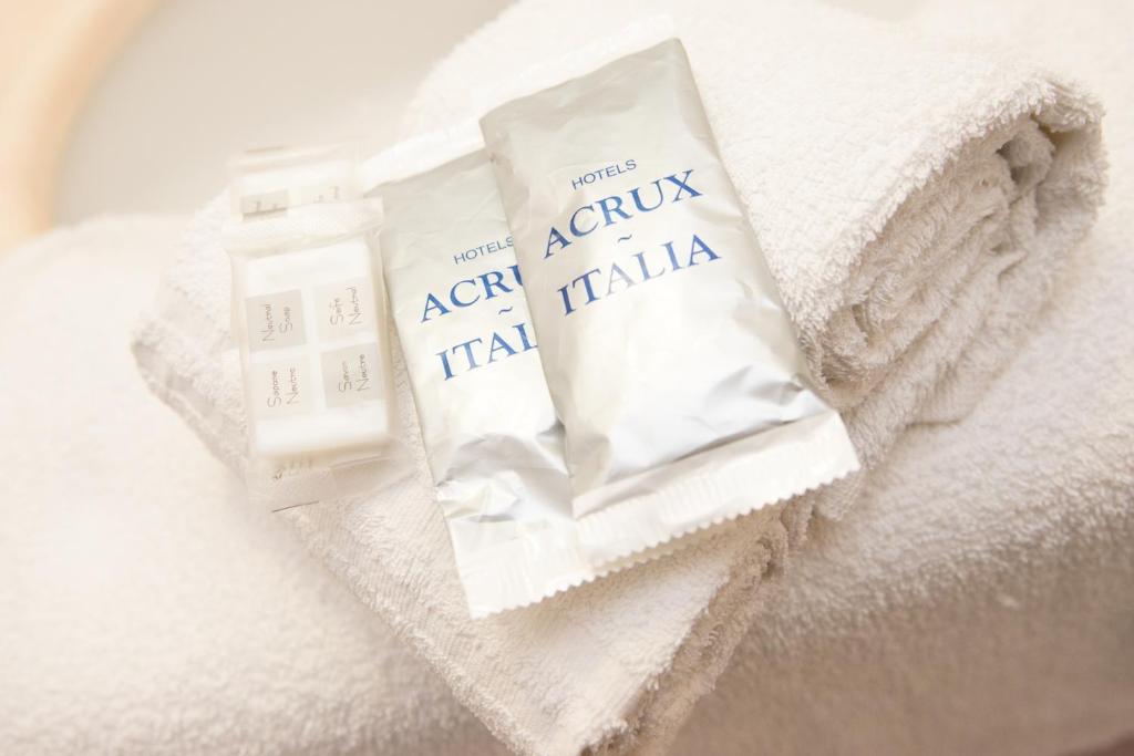 Postel nebo postele na pokoji v ubytování Hotel Acrux