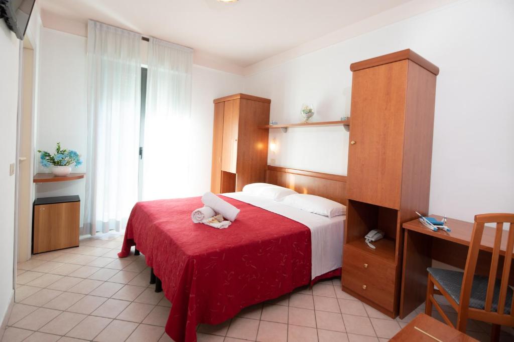 Postel nebo postele na pokoji v ubytování Hotel Acrux