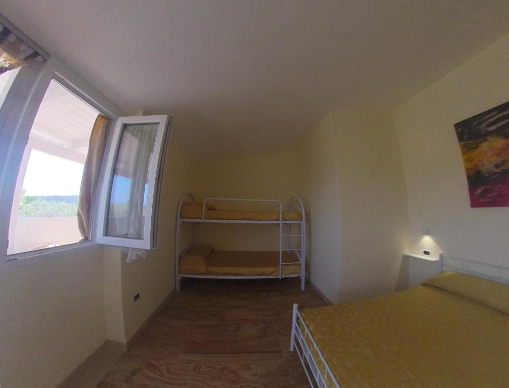 Postel nebo postele na pokoji v ubytování Villa Terra Nostra
