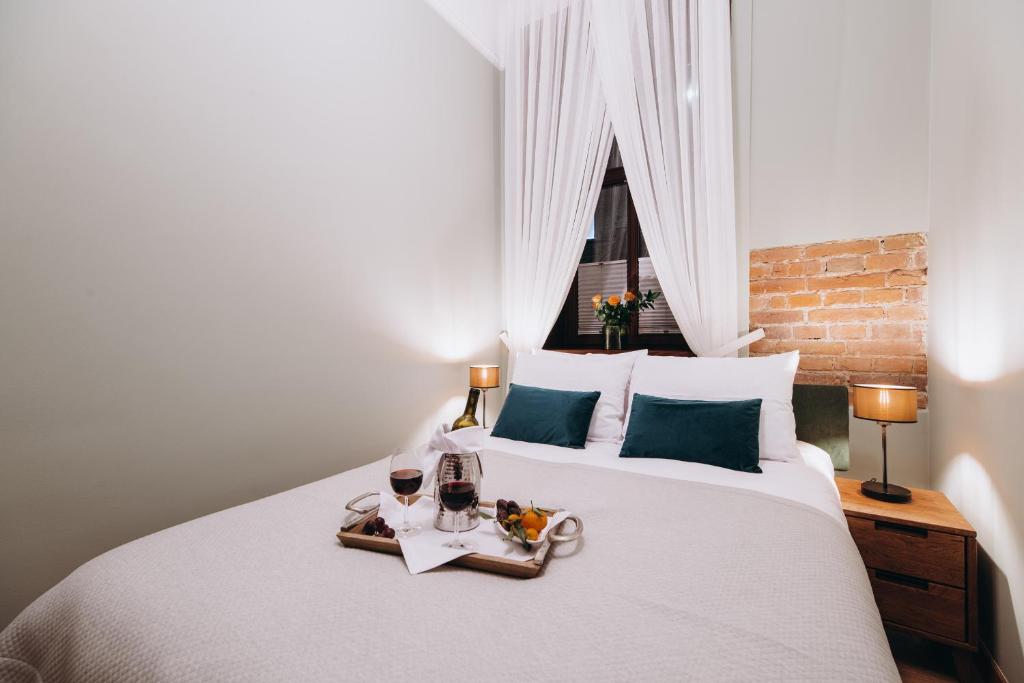 Posteľ alebo postele v izbe v ubytovaní Apart Residence Ariańska 16 by NEARTO PL