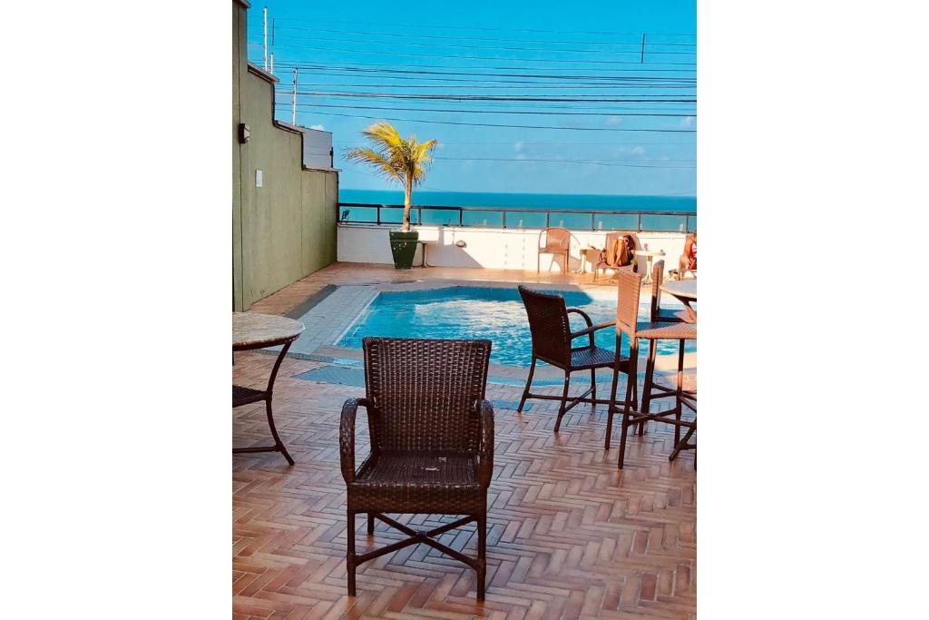  Confortável suíte com vista mar em Ponta Negra por Carpediem