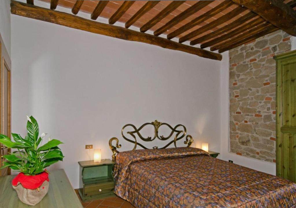 Postel nebo postele na pokoji v ubytování I Sette Borghi