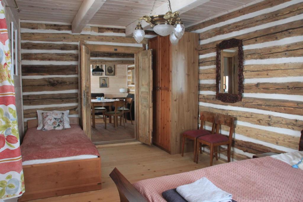 Posteľ alebo postele v izbe v ubytovaní Utopia Dom przy winnicy