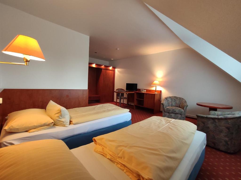 Postel nebo postele na pokoji v ubytování Condi Hotel