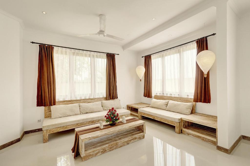 Posezení v ubytování Nipuri Resort and Villas Seminyak by Kamara
