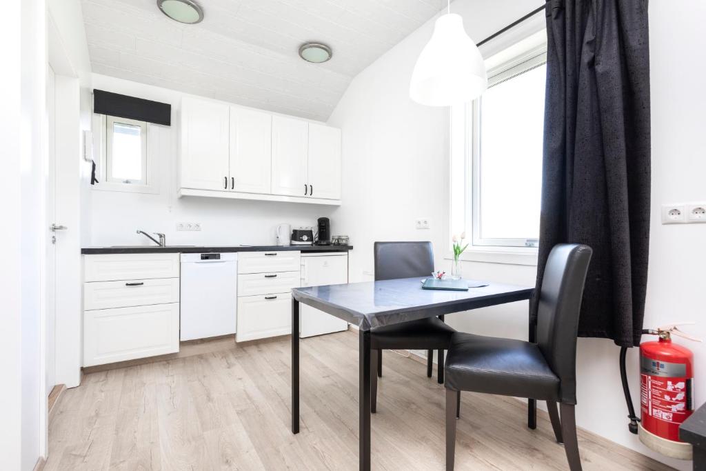 Eldhús eða eldhúskrókur á Hvammból Guesthouse