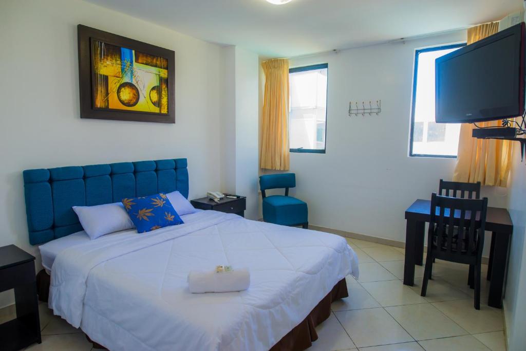 Postel nebo postele na pokoji v ubytování Hotel Presidente Beach Salinas