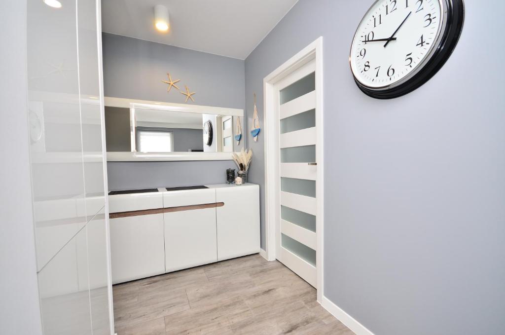 Kuchyň nebo kuchyňský kout v ubytování APARTAMENT - DZIWNÓWEK - LEŚNE TARASY - 45B/10 - 150 M OD MORZA