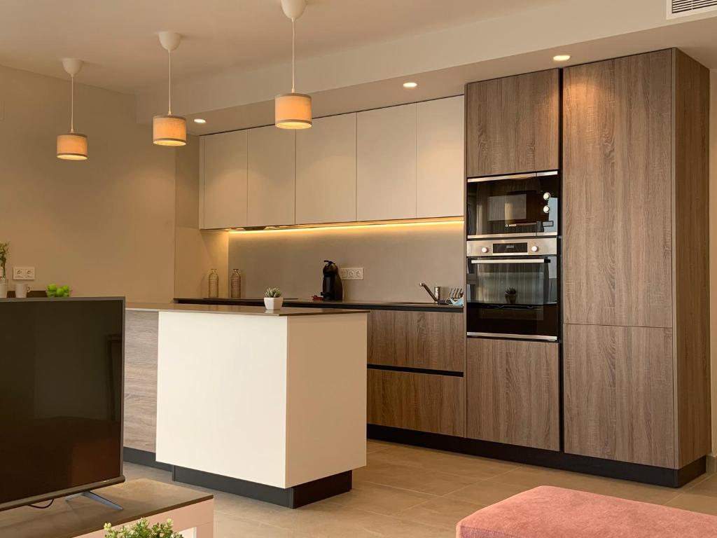A kitchen or kitchenette at Apartamentos Maren
