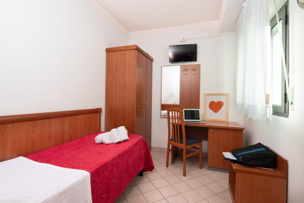 Postel nebo postele na pokoji v ubytování Hotel Acrux