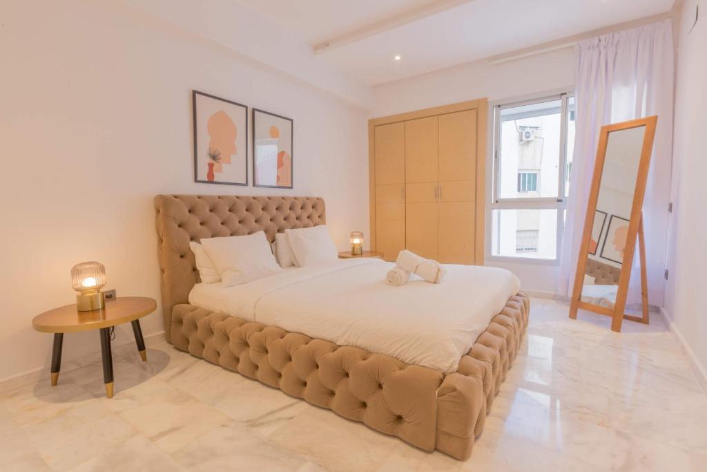Postel nebo postele na pokoji v ubytování Stayhere Rabat - Agdal 2 - Classic Residence