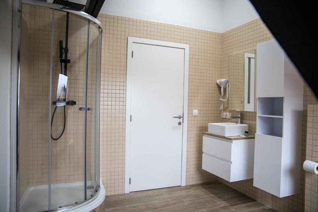 Vannituba majutusasutuses Hotel Guzy