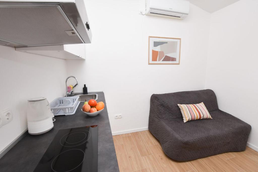 Kuchyň nebo kuchyňský kout v ubytování Apartments Nina