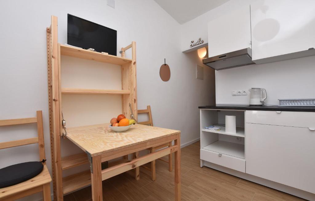 Kuchyň nebo kuchyňský kout v ubytování Apartments Nina