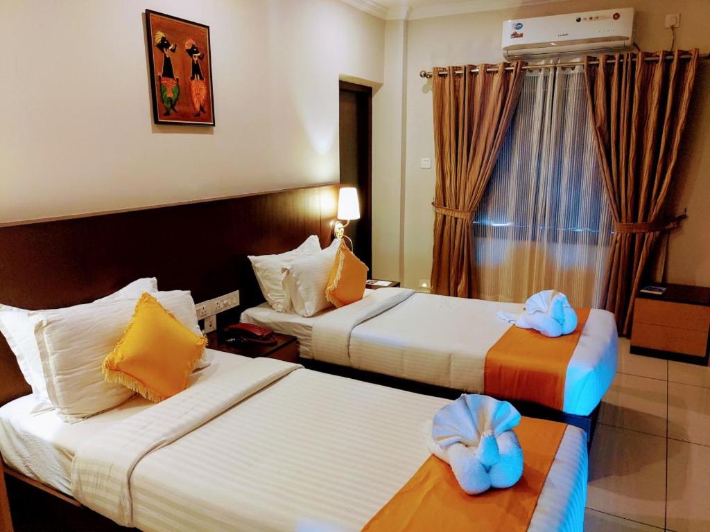 Postel nebo postele na pokoji v ubytování Hotel Virad