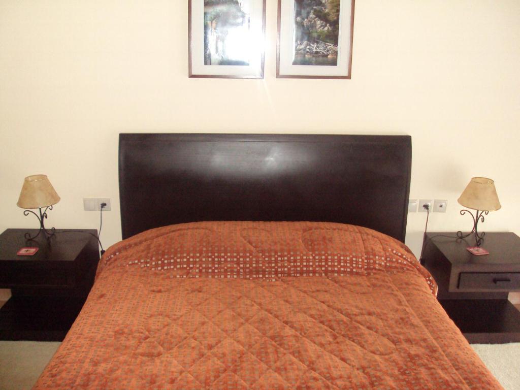 Postel nebo postele na pokoji v ubytování Agrabeli Apartments