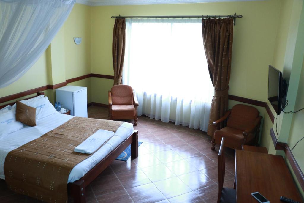 Televisor o centre d'entreteniment de ACK Guest House Nairobi