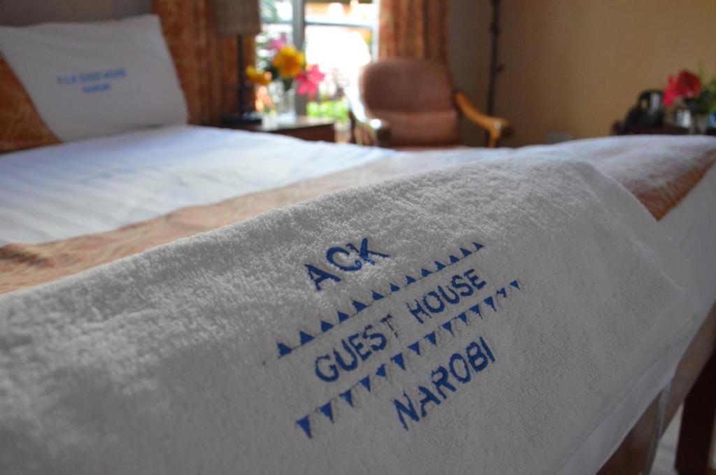 Llit o llits en una habitació de ACK Guest House Nairobi
