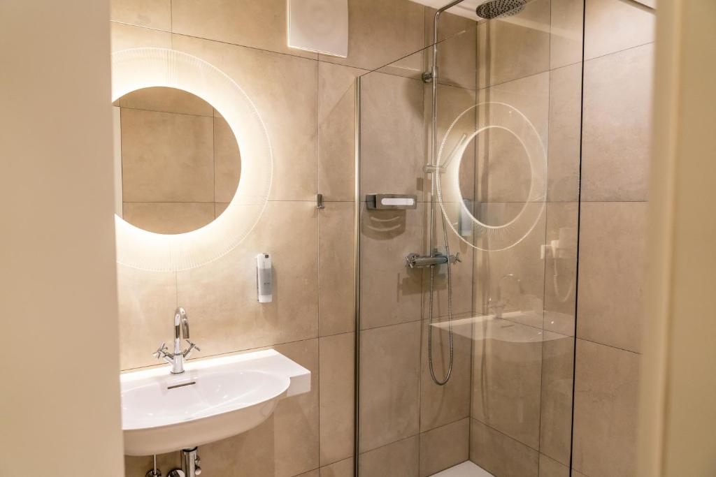 Koupelna v ubytování Stadthotel Styria