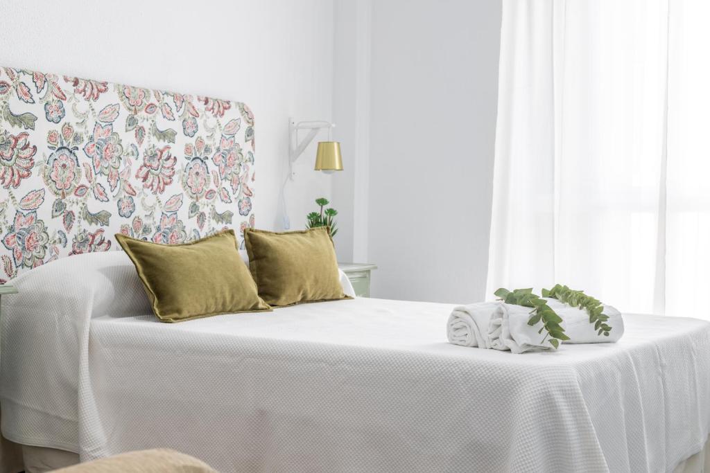 Postel nebo postele na pokoji v ubytování Hotel Marhava
