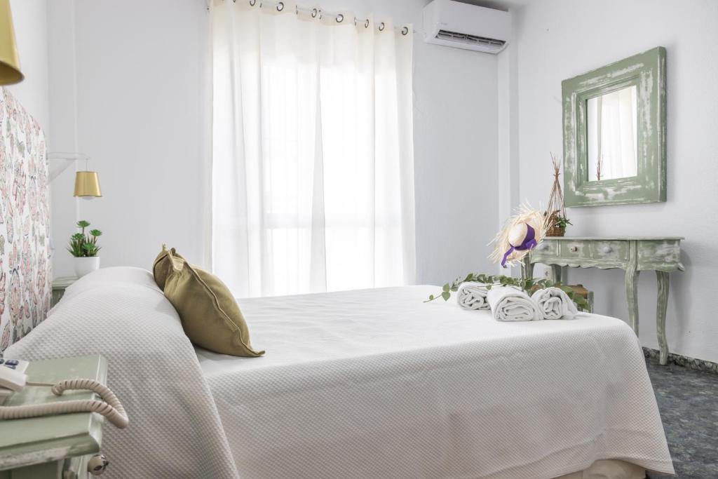 Postel nebo postele na pokoji v ubytování Hotel Marhava