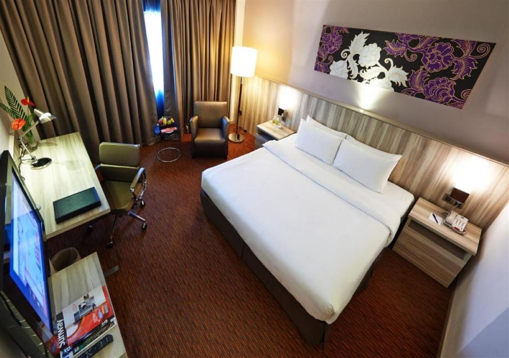 Postel nebo postele na pokoji v ubytování Sunway Hotel Seberang Jaya