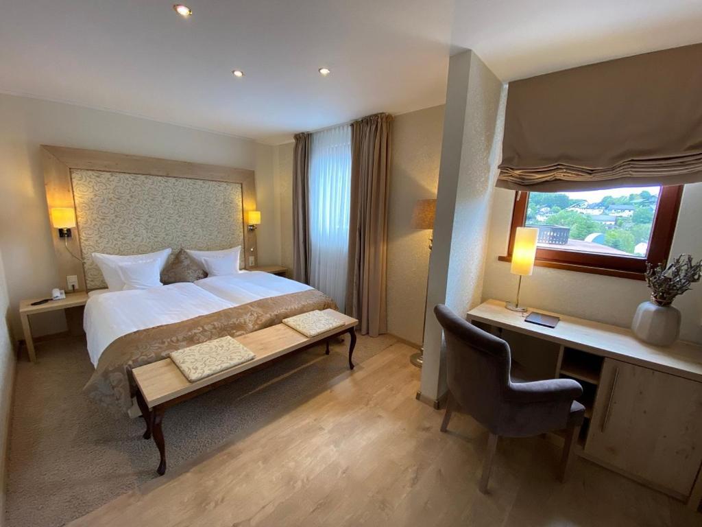 Postel nebo postele na pokoji v ubytování Hotel Hennemann