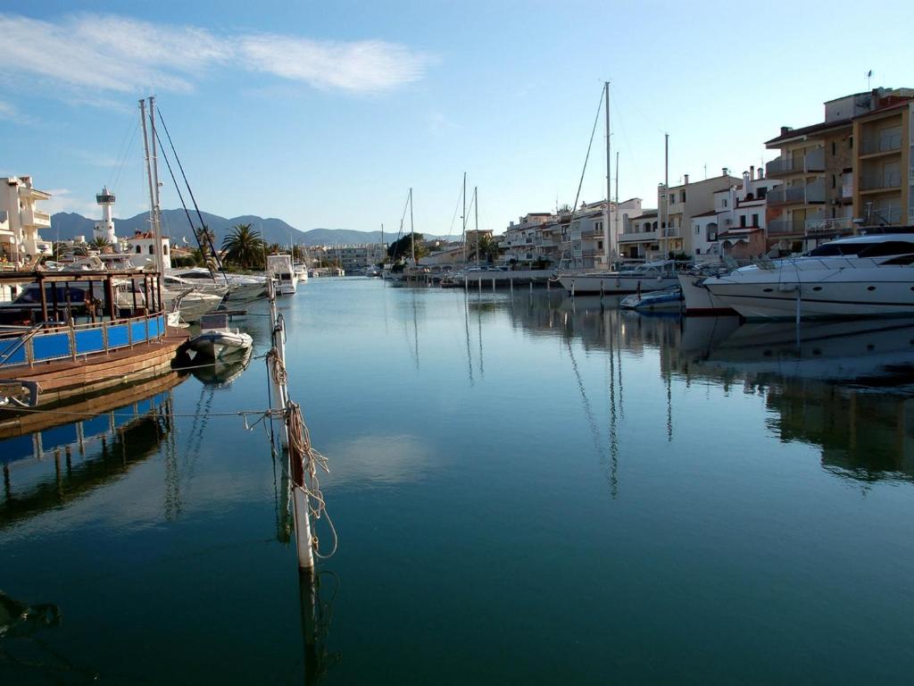 a group of boats are docked in a harbor at Pierre & Vacances Empuriabrava Marina in Empuriabrava
