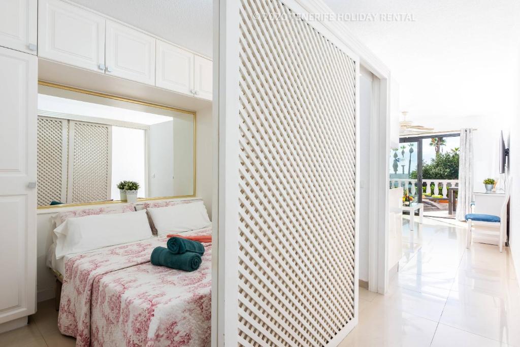 Postel nebo postele na pokoji v ubytování Tenerife Royal Gardens - Viviendas Vacacionales