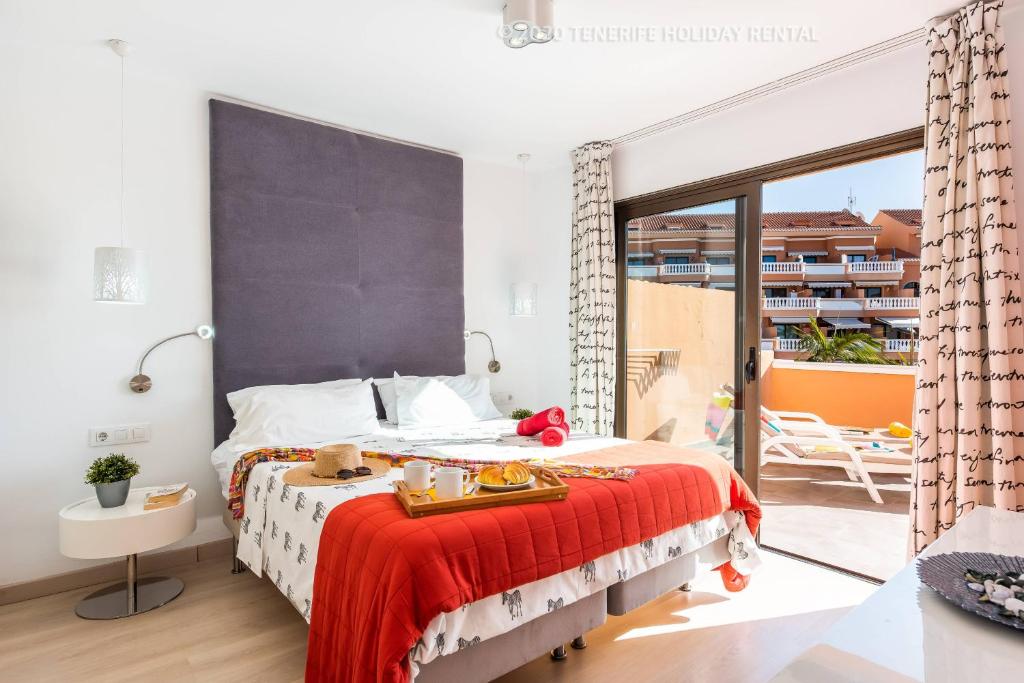 Postel nebo postele na pokoji v ubytování Tenerife Royal Gardens - Viviendas Vacacionales